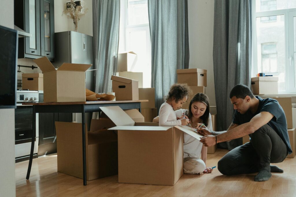 pexels-photo-4569340-4569340 Family Unpacking After Moving
